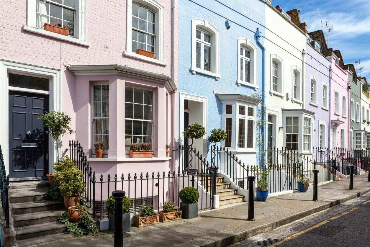 A row of multi-colored terrace houses in Chelsea, London.