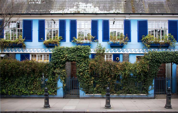 Colourful building covered with foliage in Notting Hill, London.