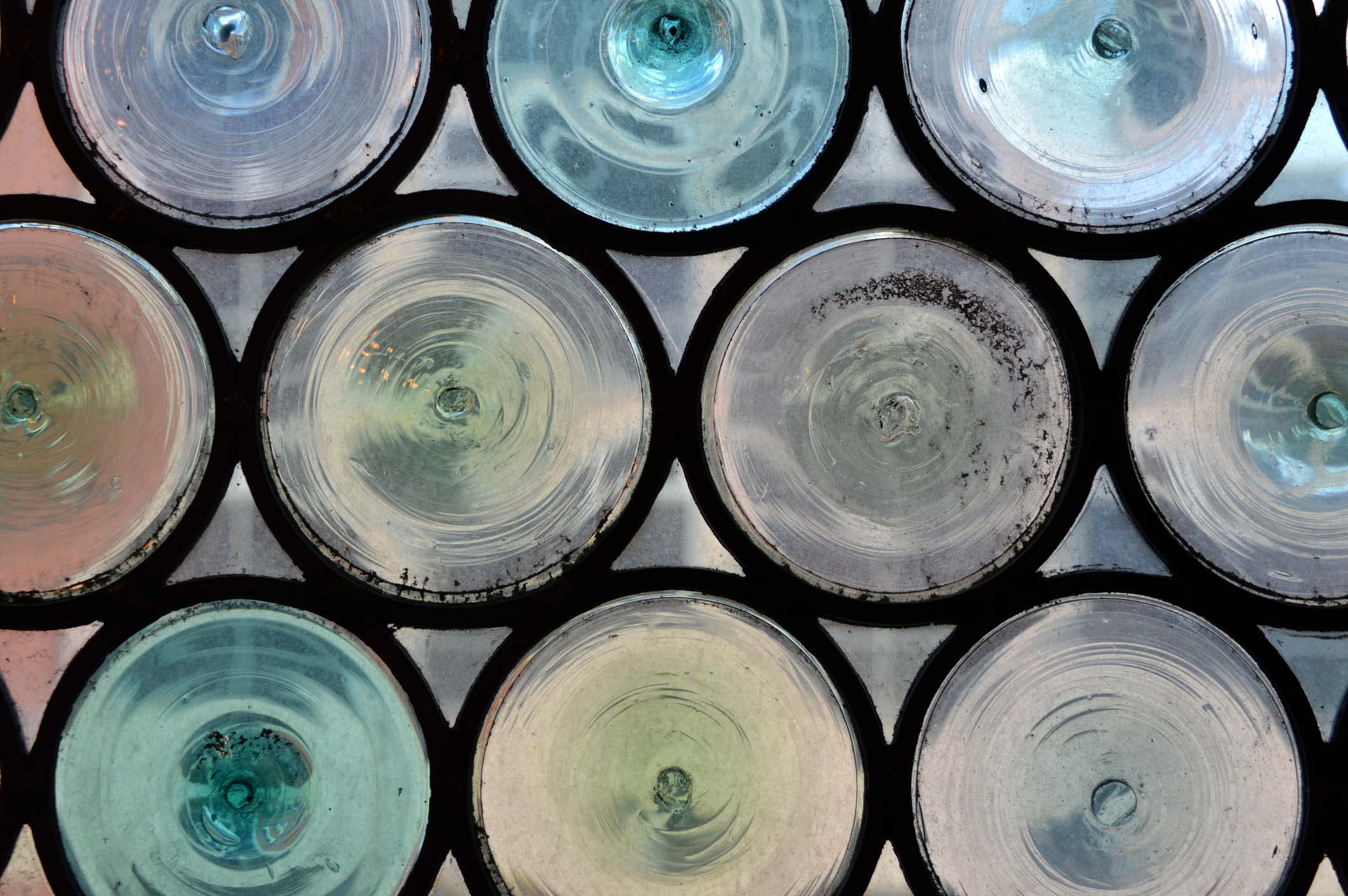 Bottle Glass Windows in the John Rylands Library, Deansgate, Manchester, UK.