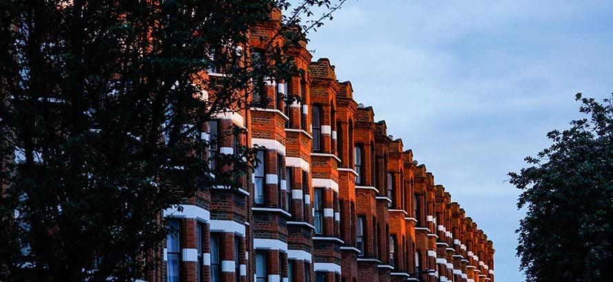 A row of red brick terraced houses in Wandsworth.