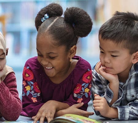 children reading in a library