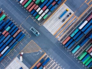 Shipping dock, with many containers ready to make their journey overseas. Santa Fe Relocation offers sea, air and road transport for your next International Move. 