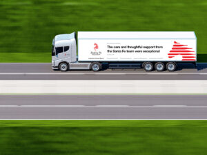 Santa Fe Relocation moving truck on the road. Making one of 100s of international moves for their customers. 